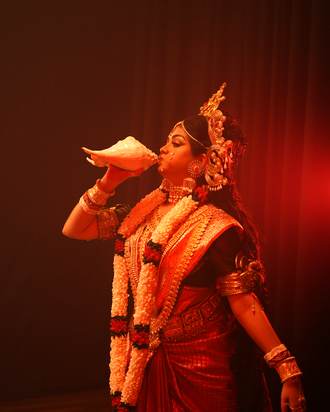 Durga sounding the conch